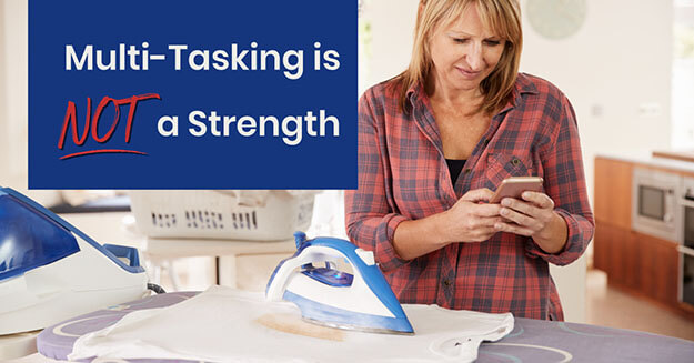 A woman trying to to juggle too many tasks with the words multitasking is not a strength.
